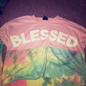 A long sleeve Crop top with the word ‘Blessed’
